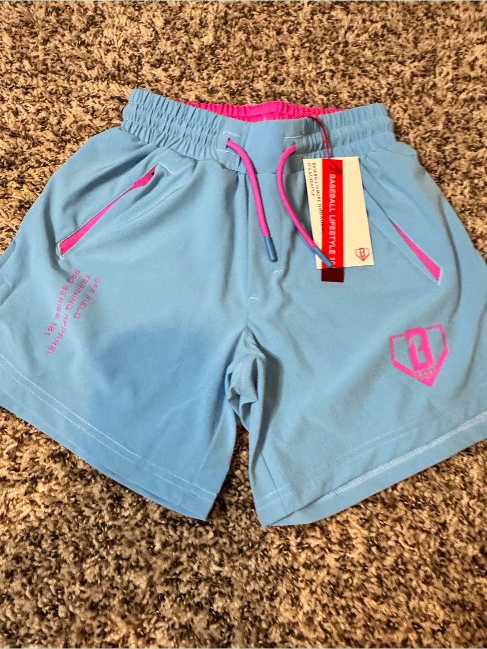 Light Blue Kid’s YS BASEBALL-LIFESTYLE 101 Athletic Shorts with Pink Accents - Picture 2 of 9